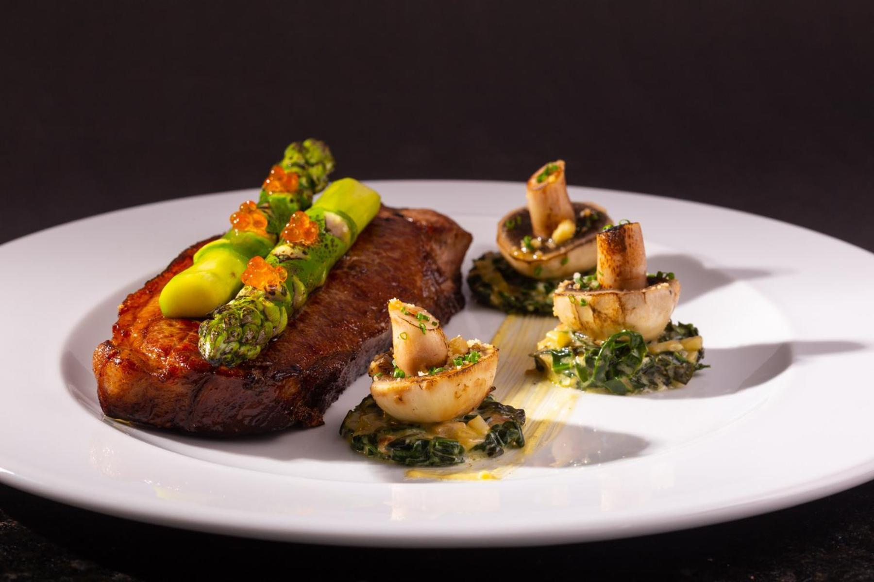 Hotel San Fernando Plaza Medellín Esterno foto A steak prepared by a private chef